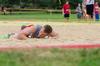 08/234/15 - A contestant in the Residence Life 1/2K crawls through sand to help his building get points for the Union Cup.