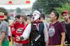 08/234/15 - Sophomore theatre major Samuel Edgren, dressed in Scottish garb, cheers on friends alongside Jake Leach, sophomore Christian ministry/missions major during the Union Cup 1/2K.