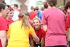 08/234/15 - Kaylene Kalkbrenner, sophomore music major, and the other residents in her building huddle for a cheer before the Residence Life 1/2K in front of the Bowld Student Commons. This event was the first in the Union Cup competition.