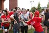 09/250/15 - Students pose for a picture after being painted with Union University school colors at the Pre-game Paint Up event hosted by Residence Life. 