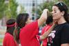 09/247/15 - Kayla McKinney, residence director of the women's quads, gets a little face paint before the first men's soccer home game of the season.