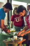 09/251/15 - MacLin Williamson, junior biology major, helps prepare S'mores alongside Cody Curtis, Assistant Residence Director, during Residence Life's Progressive Snacking.