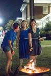 09/251/15 - Hannah Barr, sophomore art studio major, Elise Galbreath, sophomore Spanish major, and Heather Porter, junior theatre major, roast S'mores outside of Watters 1 during Residence Life's Progressive Snacking.