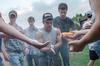 09/272/15 - Alex Herman, freshman cell and molecular biology major, applies powder alongside his Dodd comrades before the tug-of-war. 