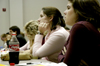 Seniors Melanie Rickett (right) & Jenny Heuiser (center) listened closely to speakers at the fourth annual Career University. - Photo by Kathleen Murray