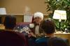 11/334/15 - Dub Oliver, president of the university, reads 'Twas the Night Before Christmas to students during the annual Storytime with the Olivers event in the McAfee Commons. 