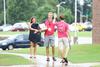 08/232/16 - A new student high-fives his new residence advisor as he carries his things to his room.