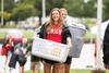 08/232/16 - Adrian Lamp, sophomore nursing major, helps carry items into the Heritage Complex during new student move-in day.