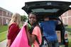08/232/16 - EDGE program students and mentors help during new student move-in day.