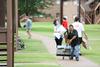 08/232/16 - Don Van, professor of engineering, helps move new students into their rooms in Heritage.