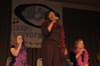 Megan Lueck, Jennifer Nelson and Beth Saxe entertain during All-Sing 2004. - Photo by Kathleen Murray