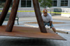 Contemporary artist STRETCH oversees the installation of his sculpture, "Guardian." This piece is one of the selections for the Jackson Union Sculpture Tour (JUST). - Photo by Amanda Herron