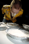Senior Patrick Myers participated in a pie-eating contest during the Hurt Costume Coffee House. - Photo by Amanda Herron