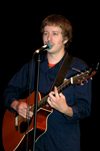 A recently kissed Nic Pfost performed at Alpha Psi Omega's Cafe Bongo. - Photo by Amanda Herron