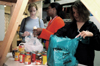 Lindsey McDonald, Autumn Smith and Sarah Bradley deliver supplies to the Care Center as a part of a Student Association of Social Workers project. - Photo by Amanda Herron