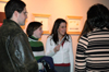 Senior Heather Wilmore, graphic design major, discusses her exhibit with family
and friends at her artist’s talk and reception in the Union University Art Gallery Dec. 2. - Photo by Alaina Kraus