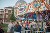09/273/17 - Josh Simmons, director for eLearning success and media services, and his son enjoy the carousel during Family Weekend Union Night. 