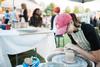 09/273/17 - Aubrey Kurt, pre-professional art therapy major, throws some pottery at the Union Night art booth during Family Weekend.