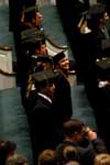 12/18/04 - Marketing graduate Carly Findley flashes a big smile up to family and friends during fall graduation 2004.