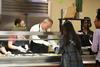 05/134/18 - Dub Oliver, president of the university, serves breakfast during Food for Finals.