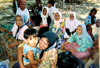 1/18/05 - Suwaktimah (subarb of Meulaboh), is an Indonesia village where senior Amy McCutcheon spent her time
helping aid villagers affected by the tsunami. Meulaboh received the most destruction and had the least amount of survivors.
