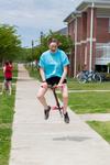 04/117/19 - Abigail Johnson, music education major, participates in the pogo stick race during Residence Life Field Day.
