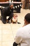 01/17/20 - Kevin Morgan, assistant residence director, poses with Buster the Bulldog during his birthday celebration in the SUB.