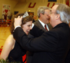 02/19/05 - Union University president David S. Dockery crowns senior Lauren Oldham as 2005 Homecoming queen during halftime of the women's basketball game Feb. 19.