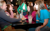 Freshmen Cheslie Tharpe, undecided major and Bekah
McElhennon, Spanish major laugh with prospective students Ashley Harrington and Lydia Marshall at Bubba's during the Scholars of Excellence weekend. - Photo by Lauren Crane