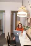 07/194/21 - Katie Simpson works on homework in the common area of a dorm room.