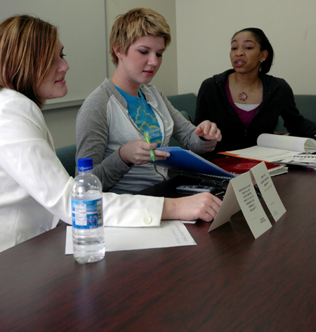 Robyn Head, Mary Head, and Vicky Graves discuss strategies to promote Common Ground, a new orginization on campus that seeks to promote diversity in the student body.