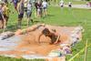 08/239/22 - Student Nathan Nuulimba races through the mud pit portion of ResLife's annual 1/2K competition.