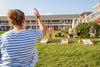 09/248/22 - Students play cornhole on the Grace Quad during ResLife's Labor Day Block Party.