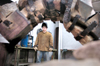 Senior Rob Alsobrook works on a metal scultpure
in his studio. Alsobrook says when he creates art he tries to have a childlike faith — he tries to 'just do the art, and to not ask questions,' he said. His senior show featuring his art opens on May 12. - Photo by Lindsay Stavish