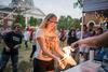 09/267/22 - Union student, Linsey Atwood, participates in a Union chemistry department experiment during Union Night on the Great Lawn.