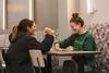 12/346/22 - Students Julia Matteson and Laila Al-Hagaal laugh and enjoy a late-night breakfast during the bi-annual Food for Finals event.