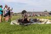 08/238/23 - Students dive into the mud pit during the Residence Life Half K.