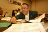 Dr. Charles Baldwin, O.P. and Evalyn Hammons university professor of pre-medical studies, advises students during the Spring Thing weekend.  - Photo by Morris Abernathy