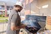 09/247/23 - Kevin Morgan, assistant director for residence life, mans the grill during the Labor Day Block Party.