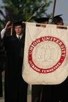 SGA President Brad Spencer leads the faculty processional at spring graduation. - Photo by Kyle Kurlick