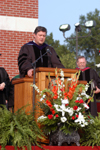 Steve Gaines, pastor of Gardendale Baptist Church and father of Biblical studies graduate Grant Gaines, leads the invocation at spring graduation. - Photo by Morris Abernathy