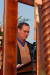 05/21/05 - Keith Absher, dean of the McAfee school of business administration, reads the names of the graduates from his school during spring graduation.
