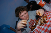 Graduating Senior Jonathan Blair participates in a hotwings eating contest during the Happy Trails social at the Dockery's. - Photo by Morris Abernathy