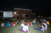 The Class of 2005 sits down to enjoy a memories slide show during the Happy Trails social at the Dockery's. - Photo by Morris Abernathy
