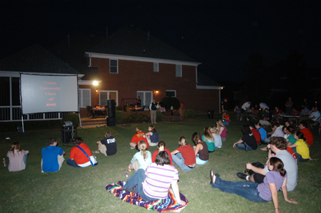 The Class of 2005 sits down to enjoy a memories slide show during the Happy Trails social at the Dockery's.