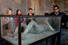 Arts in Western Civilization students get a glimpse of the first hand view of Pompeii on the annual Italy study tour.  Pictured from left to right are Beth McDowell, Liz Connava, Ron Holley and the Italian tour guide. - Photo by Amanda Herron
