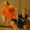 Intramural Basketball Action - Lauren Liberto makes a move against Britney Barkley. - Photo by Jonathan Blair