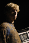 Junior Nathan Michael strikes a pose during the Young Alums' Midnight Mudness. - Photo by Kathleen Murray