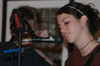 04/28/05 - Sophomore Lori Cunningham performs at the annual residence life coffee house Mochafee.