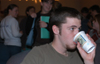 04/28/05 - Sophomore Richard Hart enjoys some hot java at the  annual residence life coffee house Mochafee.